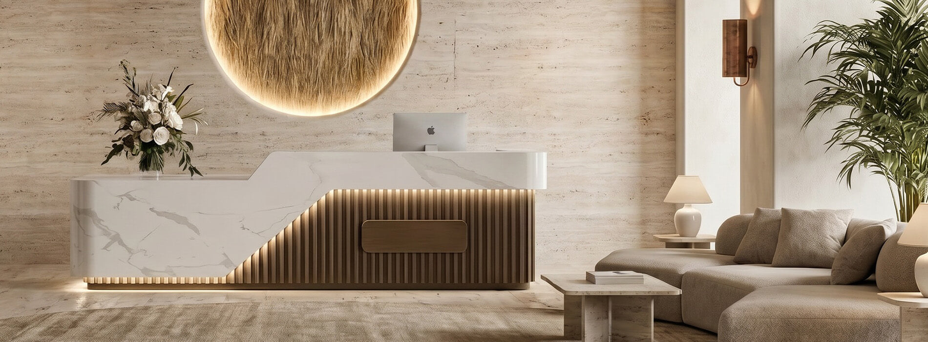 Modern reception area with marble reception desk and lounge seating